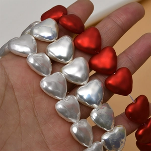 Baroque style heart-shaped shell pearl beads in matte red and pearl white for DIY jewelry