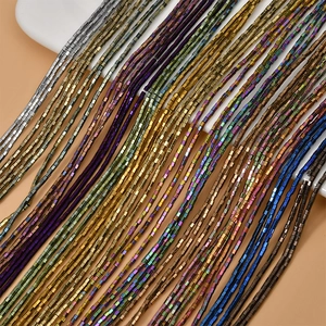 Detailed view of 2mm square metallic hematite spacer beads in various shiny colors