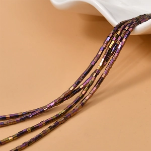 Macro shot of 2mm iridescent hematite column beads for DIY jewelry making accessories