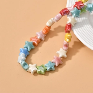 Colorful star-shaped ceramic beads on a string for DIY jewelry making and crafts