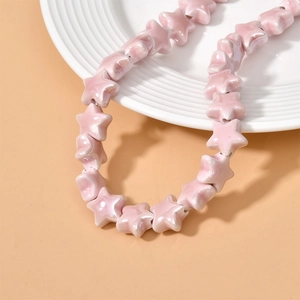 Pink ceramic star-shaped beads with glossy glaze for handmade necklace DIY crafts