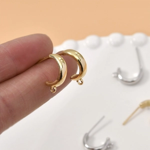 Polished gold and silver C-shaped earring hooks with loop for DIY jewelry making