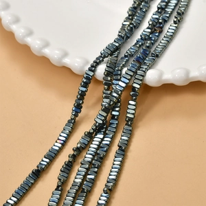 Macro shot of 2x4mm dark gray hematite loose beads for DIY jewelry making