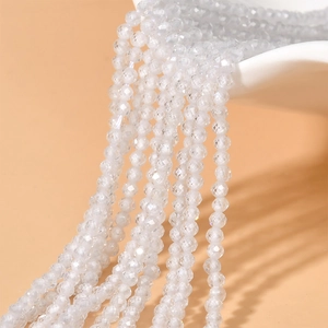 Strands of 2mm faceted translucent white zircon beads for DIY jewelry making and crafts