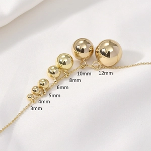 Pendentifs boules pleines plaqués or 14 carats de tailles variées de 3mm à 12mm