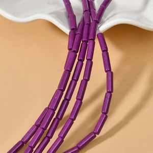 Macro detail of 4x13mm purple turquoise tube beads for DIY jewelry making material