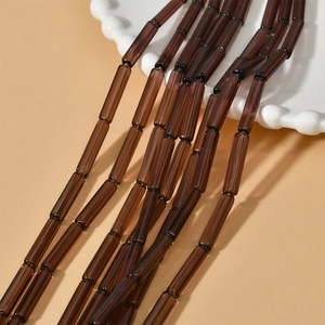 Perles cylindriques translucides brun foncé pour la création de bijoux DIY