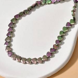Faceted 6mm heart-shaped hematite beads with iridescent metallic rainbow finish for jewelry