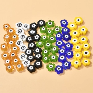 Macro shot of colorful millefiori floral glass beads for DIY jewelry and crafts