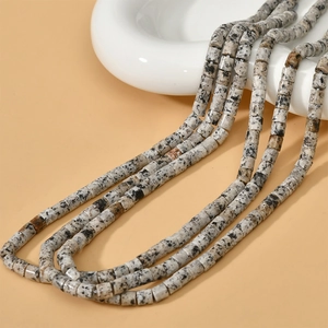 Perles de pierre naturelle cylindriques à points noirs et blancs pour bijoux DIY