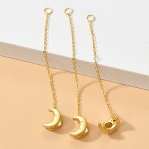 Three-piece gold crescent moon pendants with hollow flower patterns and chains for DIY jewelry
