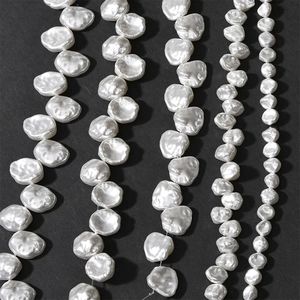 Detailed comparison of five sizes of baroque style white petal shell beads for DIY jewelry