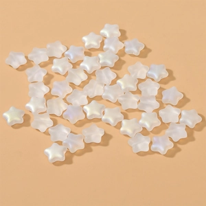 Detail shot of star-shaped AB coated frosted beads for DIY necklace and jewelry making
