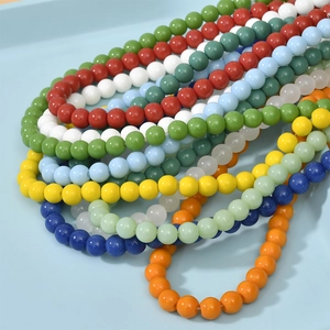 Close-up of 8mm colorful smooth glass round beads for DIY jewelry making and crafts