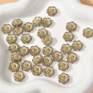 Detail von 12mm rauchgrauen Acryl-Blumenperlen mit Goldrand für DIY-Schmuckherstellung