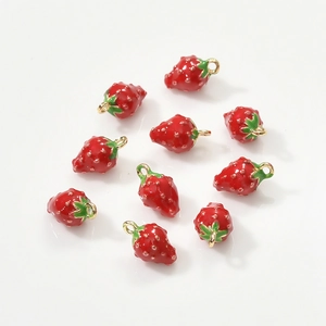 Ten-piece set of gold-plated strawberry fruit pendants with red enamel finish for jewelry DIY