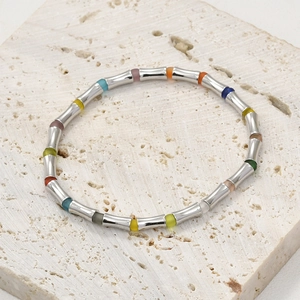 Detail of 14k gold plated cylinder bamboo beads and colorful frosted spacer beads