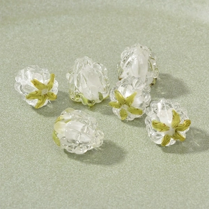 Handmade strawberry glass beads for DIY necklaces and bracelets in white and green