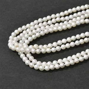 Lustrous off-white imitation cotton pearls for DIY jewelry making with matte silk texture