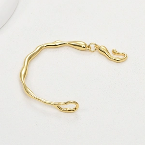 Irregular 14k gold plated branch-shaped cuff bracelet with liquid metal melt design