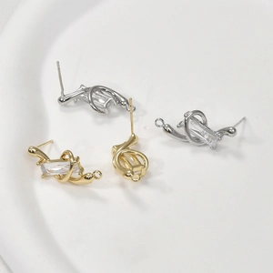 Macro view of 14k gold and silver plated rectangular zircon earrings with DIY hanging loops