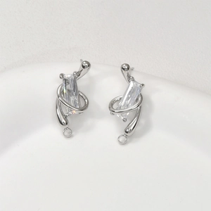 Pair of silver needle earrings with rectangular zircon and 14k gold plated fluid metal lines