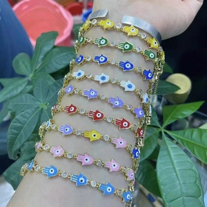 Bracelets Main de Fatma colorés avec pendentifs Œil de Mauvais et zircons dorés