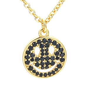 Gold plated link chain necklace with a black zircon paved smiley face pendant