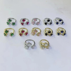 Adjustable heart shaped rings in six colors with sparkling faux diamond stone settings