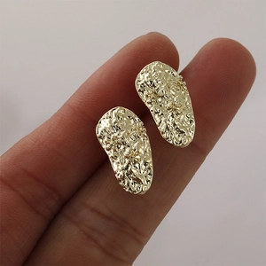 Baroque drop alloy earrings with hammered texture and floral relief on gold finish