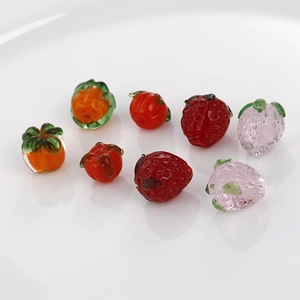 Handmade lampwork glass beads in strawberry and persimmon shapes for DIY jewelry making