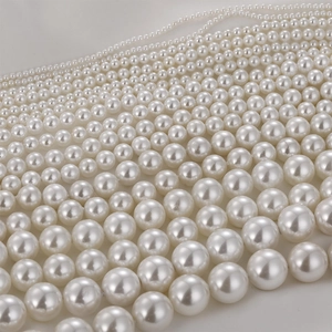 Perle di conchiglia bianche lucide in varie dimensioni per la creazione di gioielli fai da te