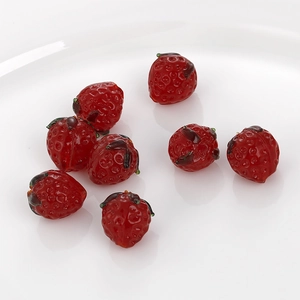 Handmade strawberry glass beads with red body and green leaves for DIY jewelry making
