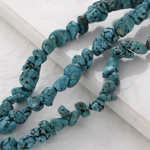 Irregular turquoise beads with natural black veins for DIY jewelry making and crafts