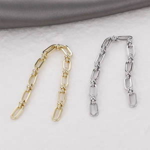 Flat lay of 14k gold and silver pig nose link chains for DIY jewelry making