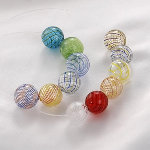 Handmade brushed glass beads with colorful spiral stripes for DIY jewelry making