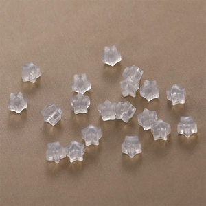 Star-shaped silicone earring back stoppers in frosted translucent finish for jewelry