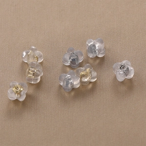 Clear flower shaped silicone earring backs with 18k gold metal core inserts