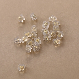 Floral silicone earring backs with 18k gold metal core for secure jewelry fastening