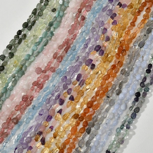 Macro shot of colorful irregular natural semi-precious gemstone chips for DIY jewelry