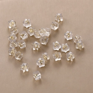 Star-shaped clear silicone earring backs with 18k gold-plated metal inserts