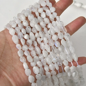 Macro shot of 5-8mm translucent irregular moonstone gravel beads for DIY jewelry making