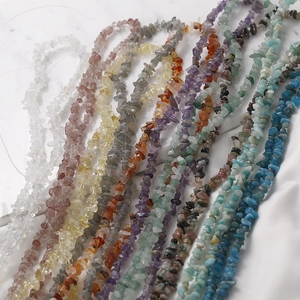 Detailed close-up of mixed natural crystal stone beads for DIY jewelry making