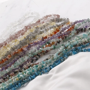 Macro detail of irregular natural stone chip beads in various colors for DIY jewelry