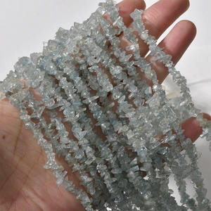 Macro view of irregular light blue aquamarine crystal beads for DIY jewelry making
