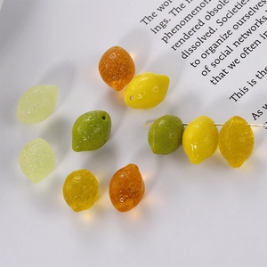 Close-up of translucent 3D lemon beads with realistic texture for DIY jewelry making