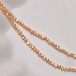 Macro di perle d'acqua dolce barocche naturali da 3-4 mm in rosa champagne per gioielli DIY