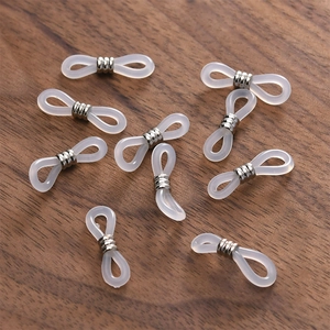 Detail shot of non-slip silicone eyeglass chain connectors with silver metal coils