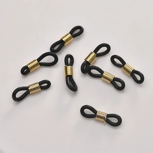 Detail of black silicone loop with 18k gold metal coil for DIY eyeglass chain accessories