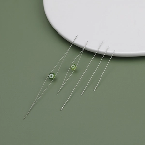 Various sizes of big eye beading needles with floral glass beads for DIY jewelry making